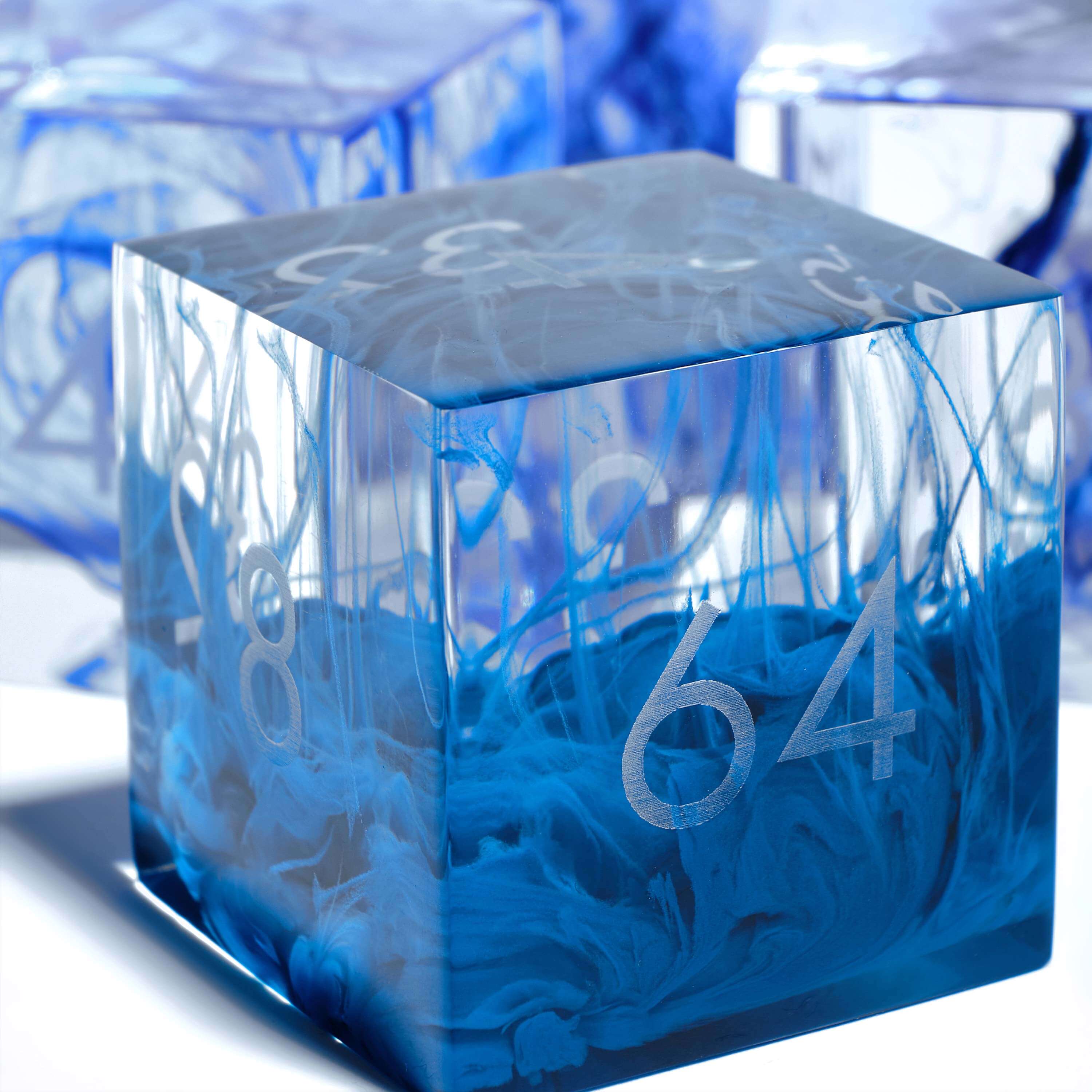 Blue streaks in a clear resin doubling cube
